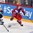 HELSINKI, FINLAND - JANUARY 4: Russia's Artur Lauta #23 stickhandles the puck away from USA's Christian Dvorak #11 during semifinal round action at the 2016 IIHF World Junior Championship. (Photo by Matt Zambonin/HHOF-IIHF Images)

